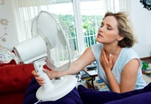 Fan Cooling a Woman