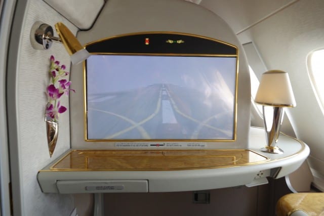 a television screen, Emirates' ICE entertainment system