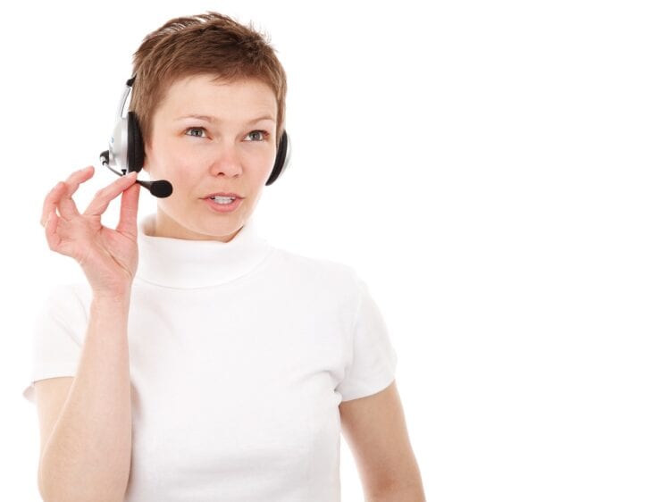 Women with telephone headset on