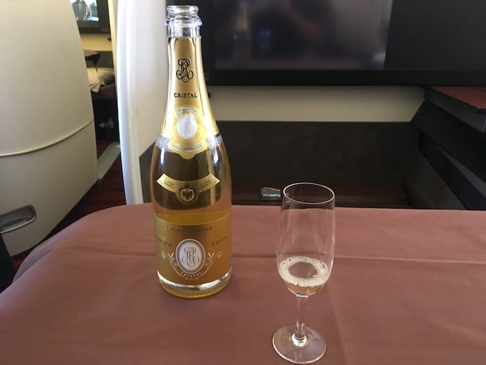 Japan Airlines drinking Cristal