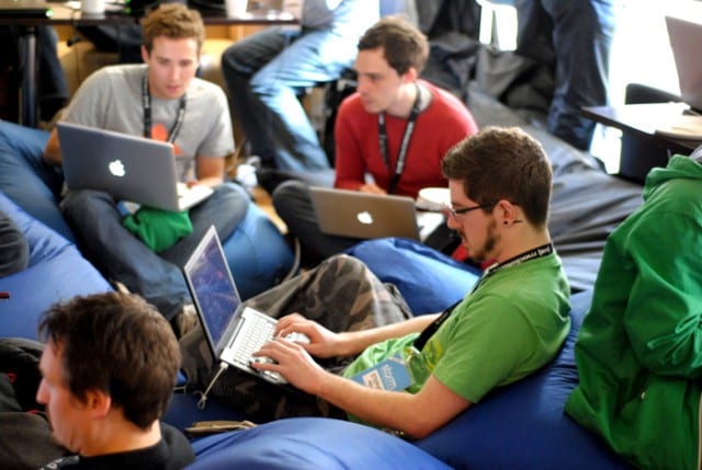 students working on macbooks