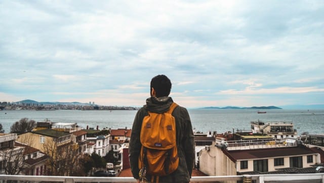 man standing with a Patagonia backpack