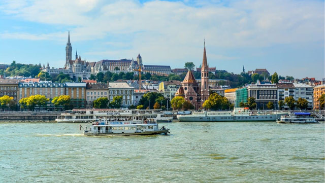 a boat on a river in Budapest