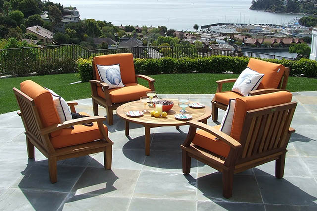 wood patio furniture with orange cushions